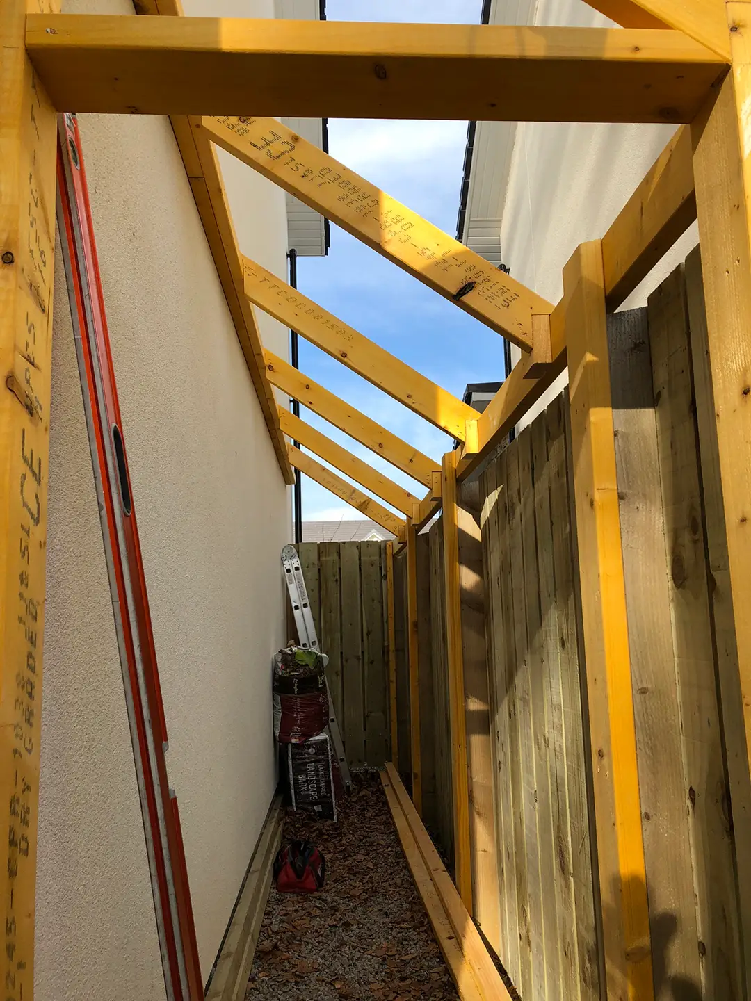 JOR Property Joinery Aberdeen showing a work in progress of a roofed extension for a house.